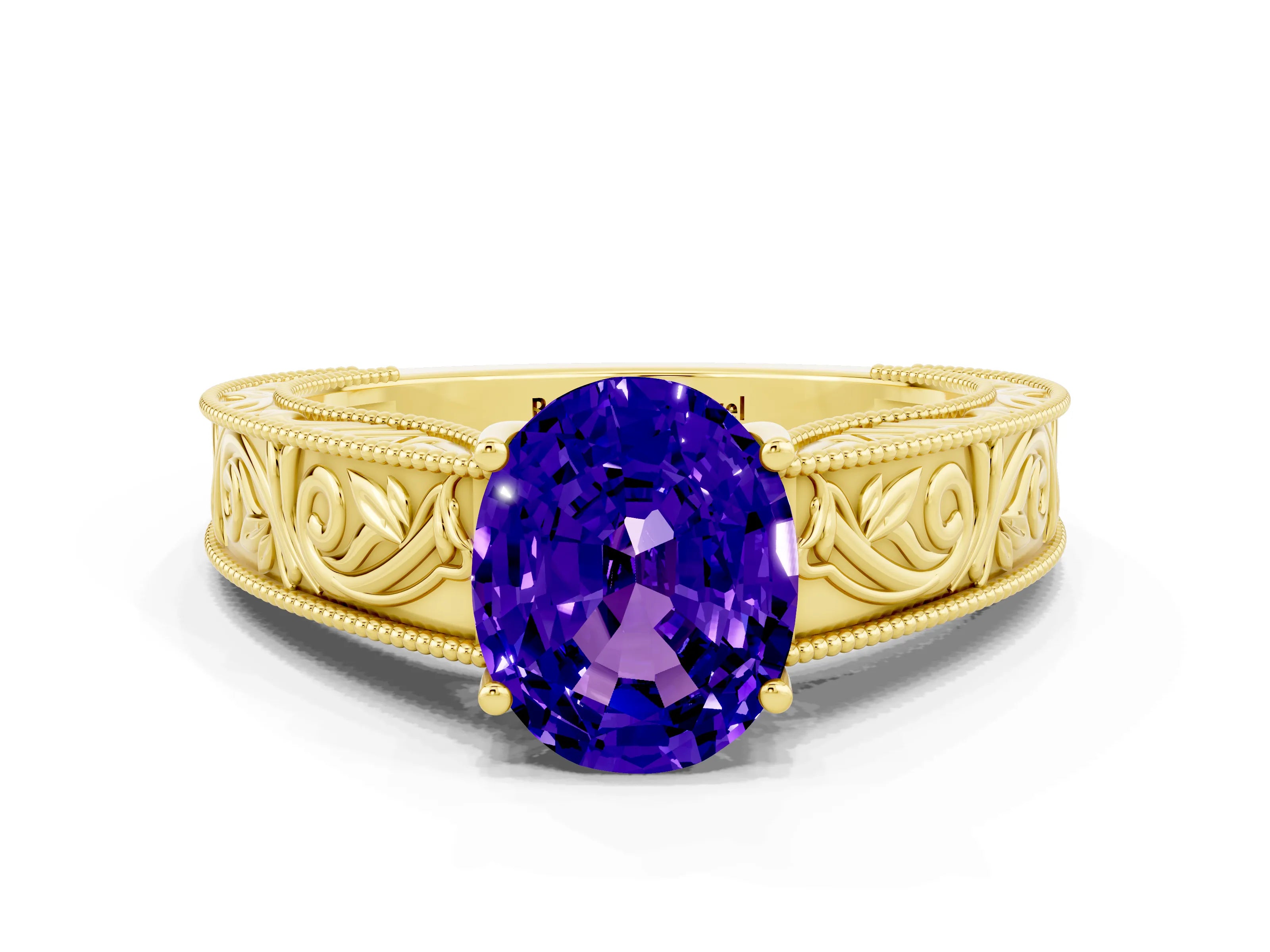 Yellow gold Oval Cut Tanzanite Solitaire Ring with Engraved Band and Four-Prong Setting