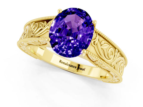 Yellow gold Oval Cut Tanzanite Solitaire Ring with Engraved Band and Four-Prong Setting_1