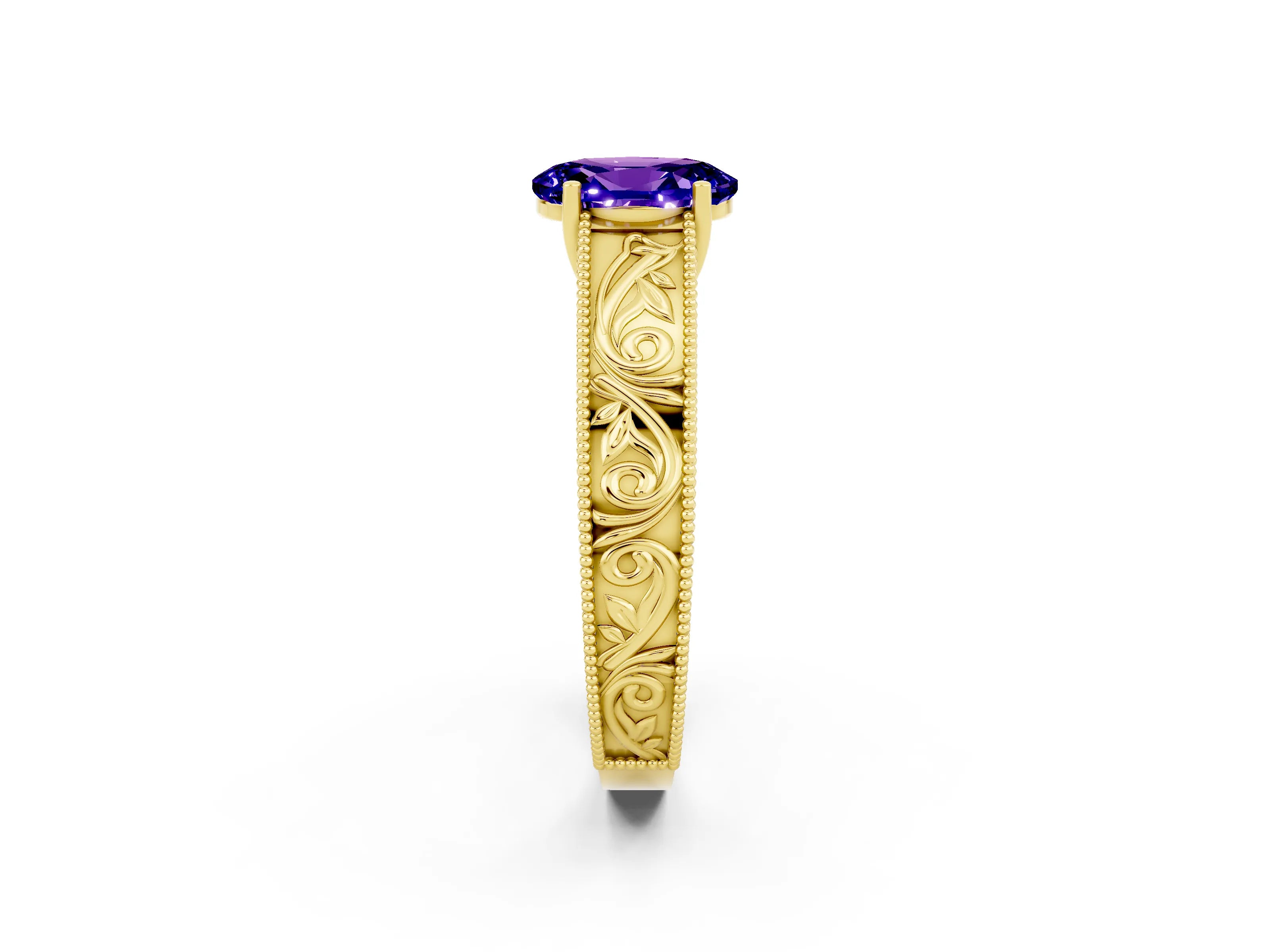Yellow gold Oval Cut Tanzanite Solitaire Ring with Engraved Band and Four-Prong Setting_2