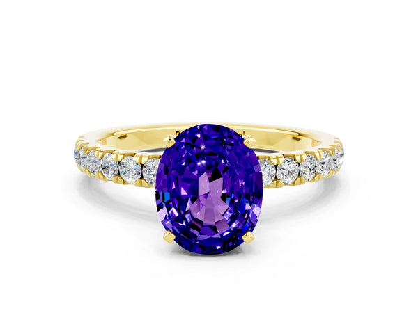 Yellow gold Oval Cut Tanzanite Solitaire Ring with Pavé Accents and Four-Prong Setting