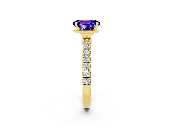 Yellow gold Oval Cut Tanzanite Solitaire Ring with Pavé Accents and Four-Prong Setting