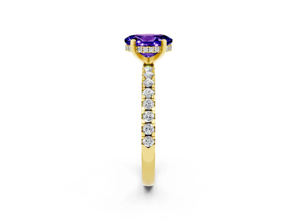 Yellow gold Oval Cut Tanzanite Solitaire Ring with Round  Pavé Band and Four-Prong Setting