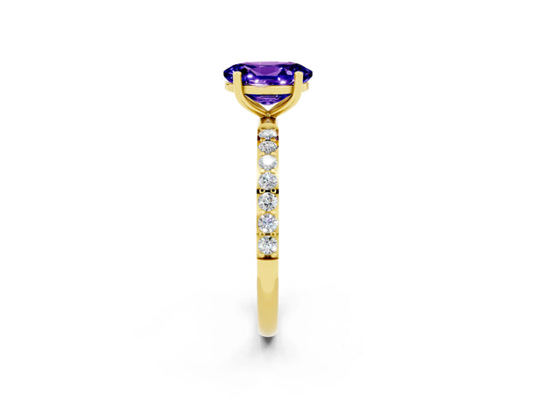 Yellow gold Oval Cut Tanzanite Solitaire Ring with Round  Pavé Band and Prong Setting