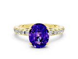 Yellow gold Oval Cut Tanzanite Solitaire Ring with Round  Pavé Band and Four-Prong Setting_36