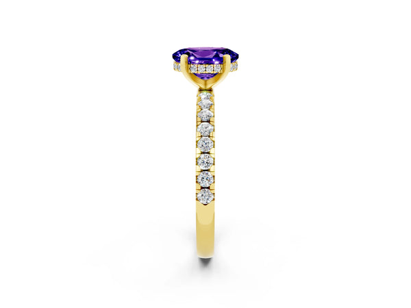Yellow gold Oval Cut Tanzanite Solitaire Ring with Round Pavé Band and Four-Prong Setting