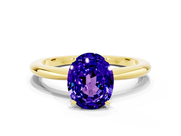 Yellow gold Oval Cut Tanzanite Solitaire Ring with Six-Prong Setting and Classic Band