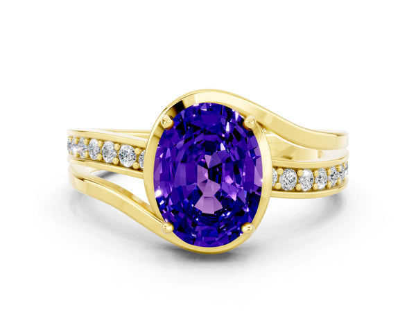 Yellow gold Oval Cut Tanzanite Solitaire Ring with Split Shank and Prong Setting