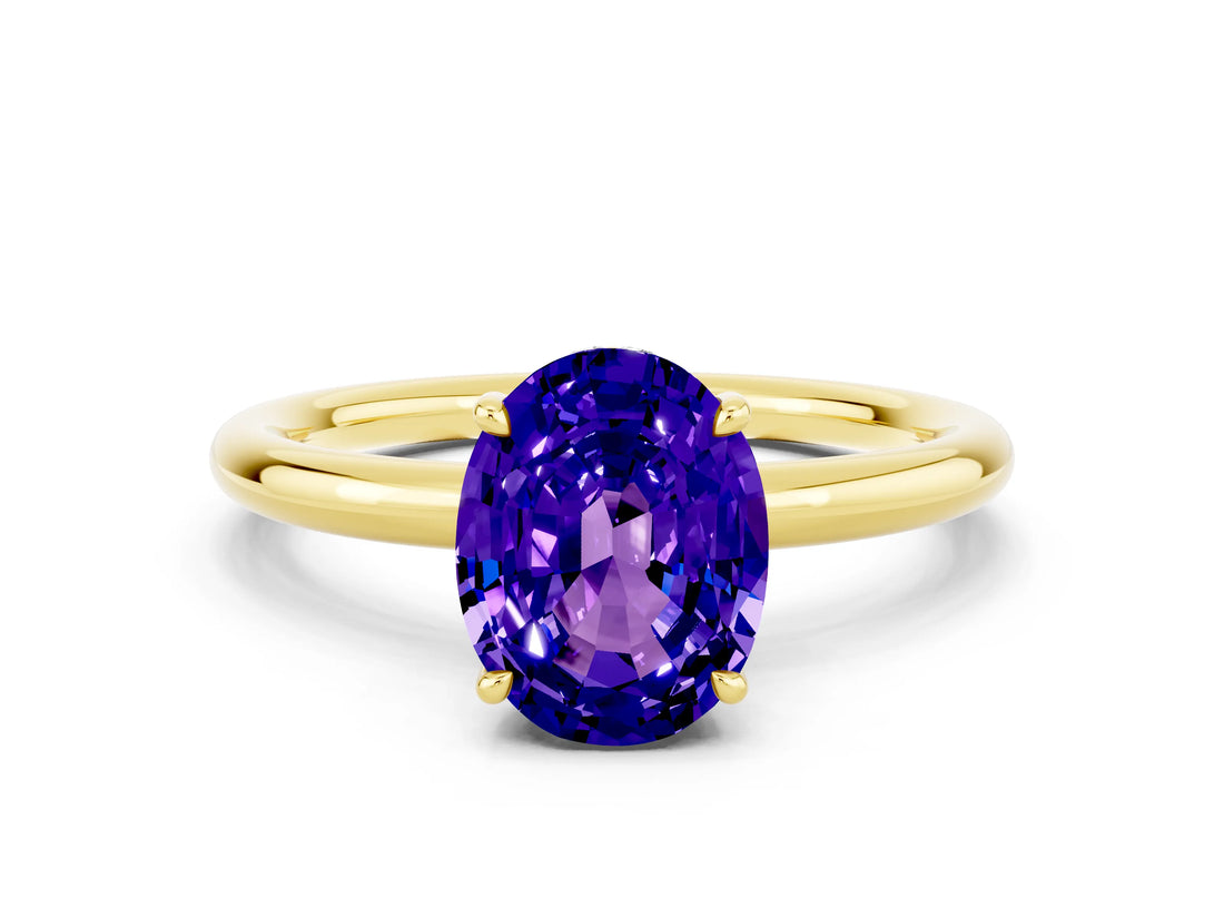 Yellow gold Oval Cut Tanzanite Solitaire Ring with Thin Band and Four-Prong Setting_12