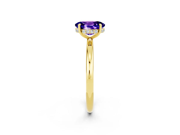 Yellow gold Oval Cut Tanzanite Solitaire Ring with Thin Band and Four-Prong Setting