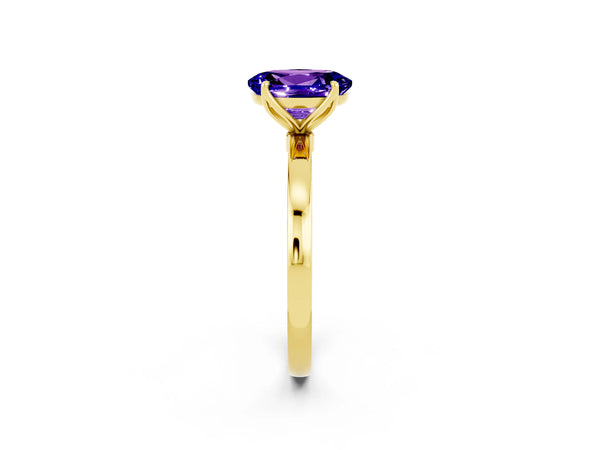 Yellow gold Oval Cut Tanzanite Solitaire Ring with Thin Band and Prong Setting