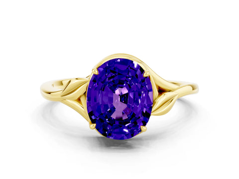 Yellow gold Oval Cut Tanzanite Solitaire Ring with Twist Band and Four-Prong Setting_24