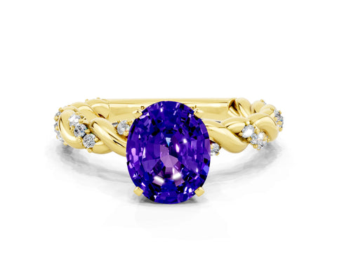 Yellow gold Oval Cut Tanzanite Solitaire Ring with Twisted Band and Pavé Accents