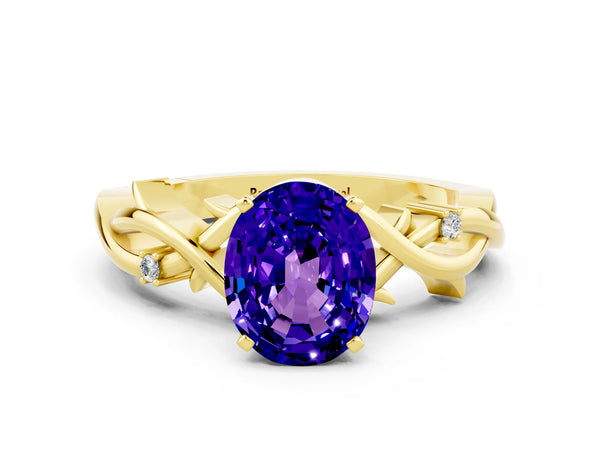 Yellow gold Oval Cut Tanzanite Solitaire Ring with Twisted Band and Prong Setting