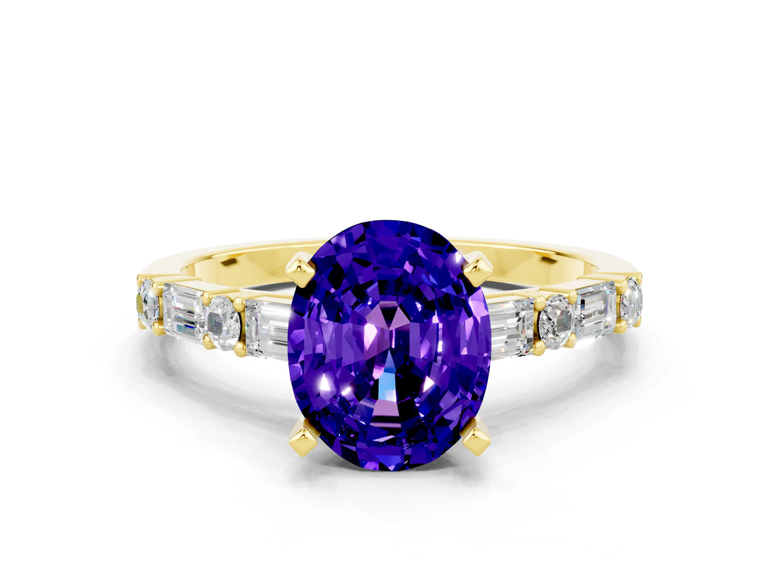 Yellow gold Oval Cut Tanzanite Solitaire with Side Baguettes and Channel Set Band