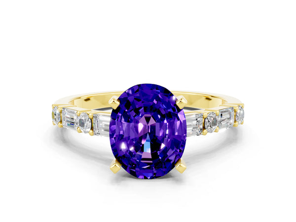 Yellow gold Oval Cut Tanzanite Solitaire with Side Baguettes and Channel Set Band