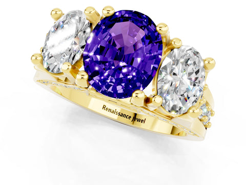 Yellow gold Oval Cut Tanzanite Three-Stone Ring with Channel Set Band and Four-Prong Setting_1