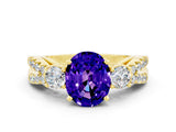 Yellow gold Oval Cut Tanzanite Three-Stone Ring with Pavé Split Shank and Four-Prong Setting_12