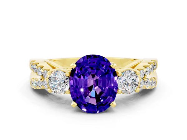 Yellow gold Oval Cut Tanzanite Three-Stone Ring with Pavé Split Shank and Four-Prong Setting