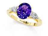 10K Yellow Gold Tanzanite Three-Stone Ring with Pear Side Stones and Prong Setting