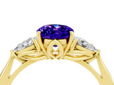 10K Yellow Gold Tanzanite Three-Stone Ring with Pear Side Stones and Prong Setting