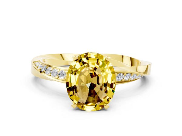 Yellow gold Oval Cut Yellow Sapphire Engagement Ring with Side Stone Accents and Four-Prong Setting