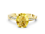 Yellow gold Oval Cut Yellow Sapphire Engagement Ring with Side Stone Accents and Four-Prong Setting_51