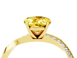 Yellow gold Oval Cut Yellow Sapphire Engagement Ring with Side Stone Accents and Four-Prong Setting_55