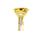 Yellow gold Oval Cut Yellow Sapphire Engagement Ring with Side Stone Accents and Four-Prong Setting_56