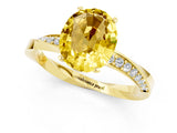 Yellow gold Oval Cut Yellow Sapphire Engagement Ring with Side Stone Accents and Four-Prong Setting_61