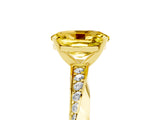 Yellow gold Oval Cut Yellow Sapphire Engagement Ring with Side Stone Accents and Four-Prong Setting_65