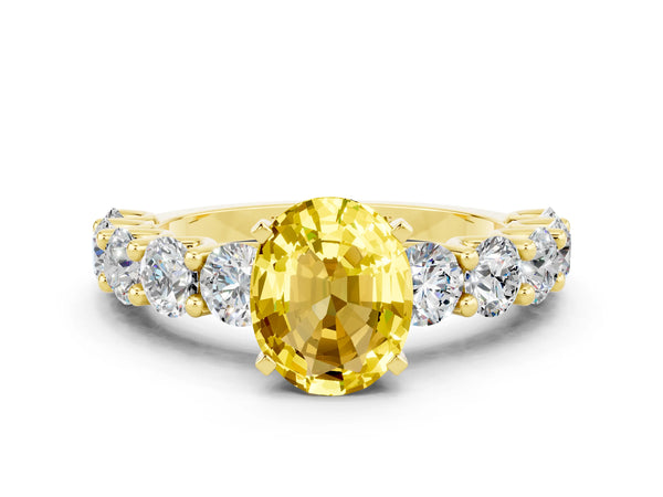 Yellow gold Oval Cut Yellow Sapphire Prong Setting with Side Stones on a Pave Band