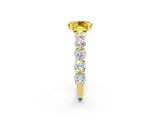 Yellow gold Oval Cut Yellow Sapphire Prong Setting with Side Stones on a Pave Band_26