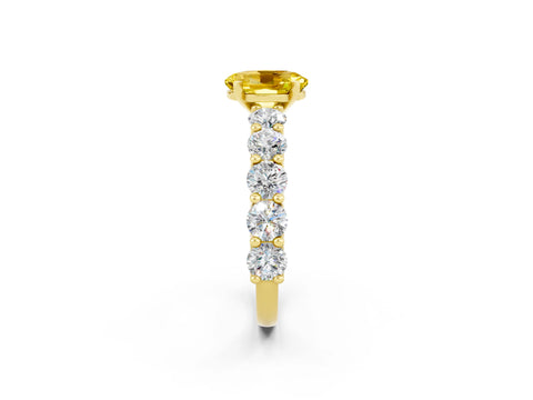 Yellow gold Oval Cut Yellow Sapphire Prong Setting with Side Stones on a Pave Band_26