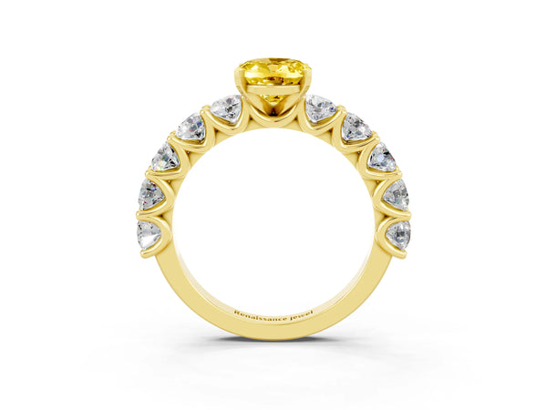 Yellow gold Oval Cut Yellow Sapphire Prong Setting with Side Stones on a Pave Band