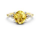 Yellow gold Oval Cut Yellow Sapphire Ring with Side Stones and Four-Prong Setting_96