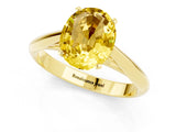 Yellow gold Oval Cut Yellow Sapphire Solitaire Engagement Ring with Cathedral Setting and Four-Prong Mount_25