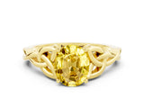 Yellow gold Oval Cut Yellow Sapphire Solitaire Engagement Ring with Celtic Knot Band and Four-Prong Setting_24