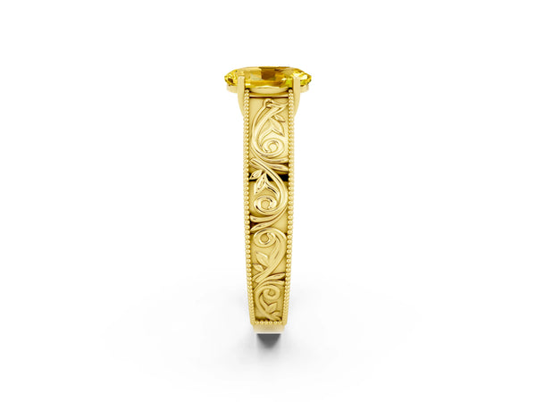 Yellow gold Oval Cut Yellow Sapphire Solitaire Ring with Engraved Band and Four-Prong Setting