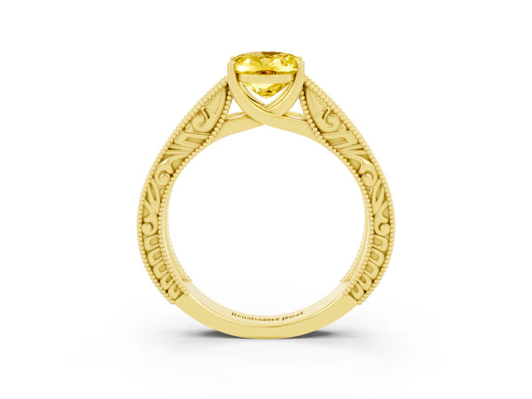 Yellow gold Oval Cut Yellow Sapphire Solitaire Ring with Engraved Band and Four-Prong Setting