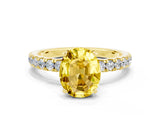 Yellow gold Oval Cut Yellow Sapphire Solitaire Ring with Pavé Accents and Four-Prong Setting_24