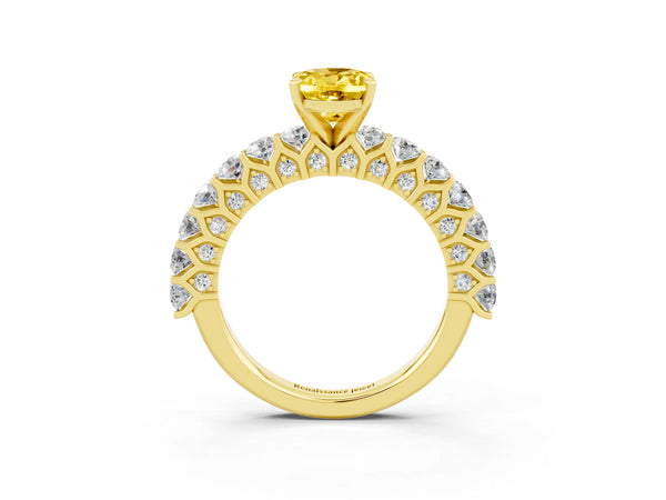 Yellow gold Oval Cut Yellow Sapphire Solitaire Ring with Shared Prong Pavé Band and Four-Prong Setting