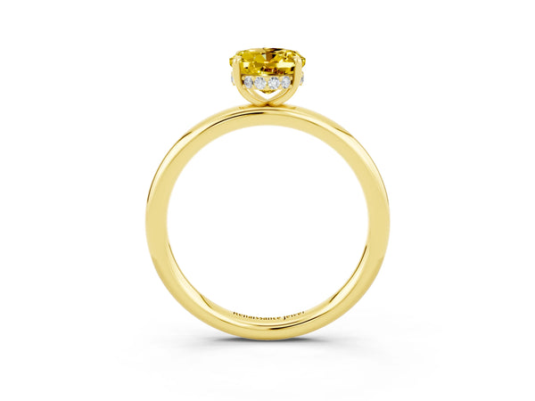 Yellow gold Oval Cut Yellow Sapphire Solitaire Ring with Thin Band and Four-Prong Setting