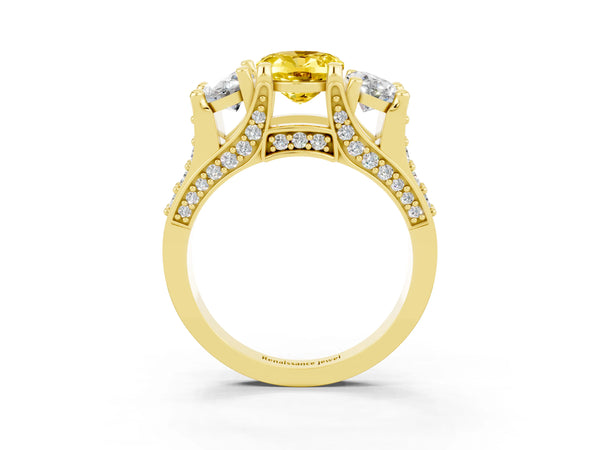Yellow gold Oval Cut Yellow Sapphire Three-Stone Ring with Channel Set Band and Four-Prong Setting