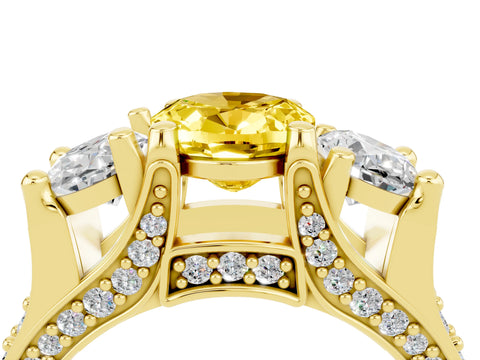 Yellow gold Oval Cut Yellow Sapphire Three-Stone Ring with Channel Set Band and Four-Prong Setting_4