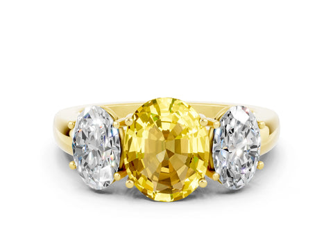 Yellow gold Oval Cut Yellow Sapphire Three-Stone Ring with Four-Prong Setting and Classic Band