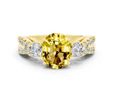 Yellow gold Oval Cut Yellow Sapphire Three-Stone Ring with Pavé Split Shank and Four-Prong Setting_36