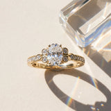 Yellow gold Oval Diamond Bezel and Prong Setting with Pave Band_24