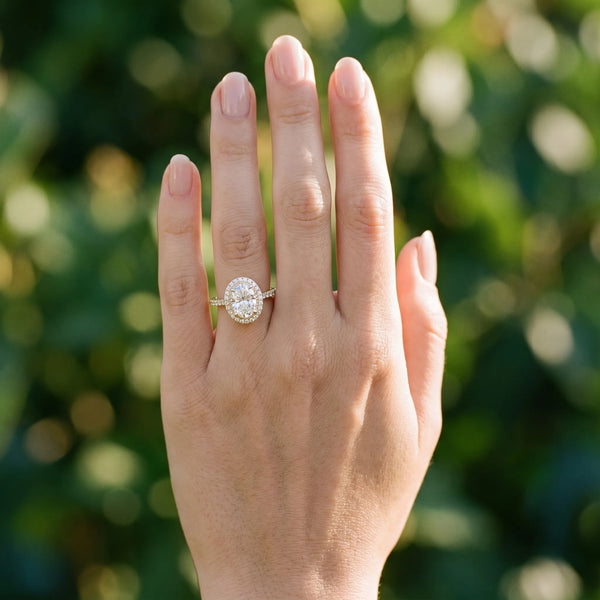 Yellow gold Radiant Cut Diamond Halo Ring with Pavé Band and Prong Setting
