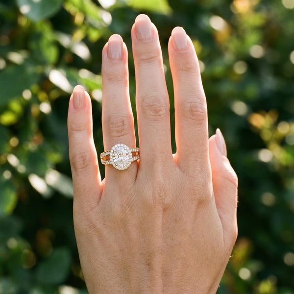 Yellow gold Oval Diamond Halo Ring with Split Shank Pavé Band and Four-Prong Setting