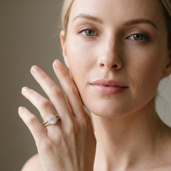 Yellow gold Oval Diamond Halo Ring with Split Shank Pavé Band and Four-Prong Setting